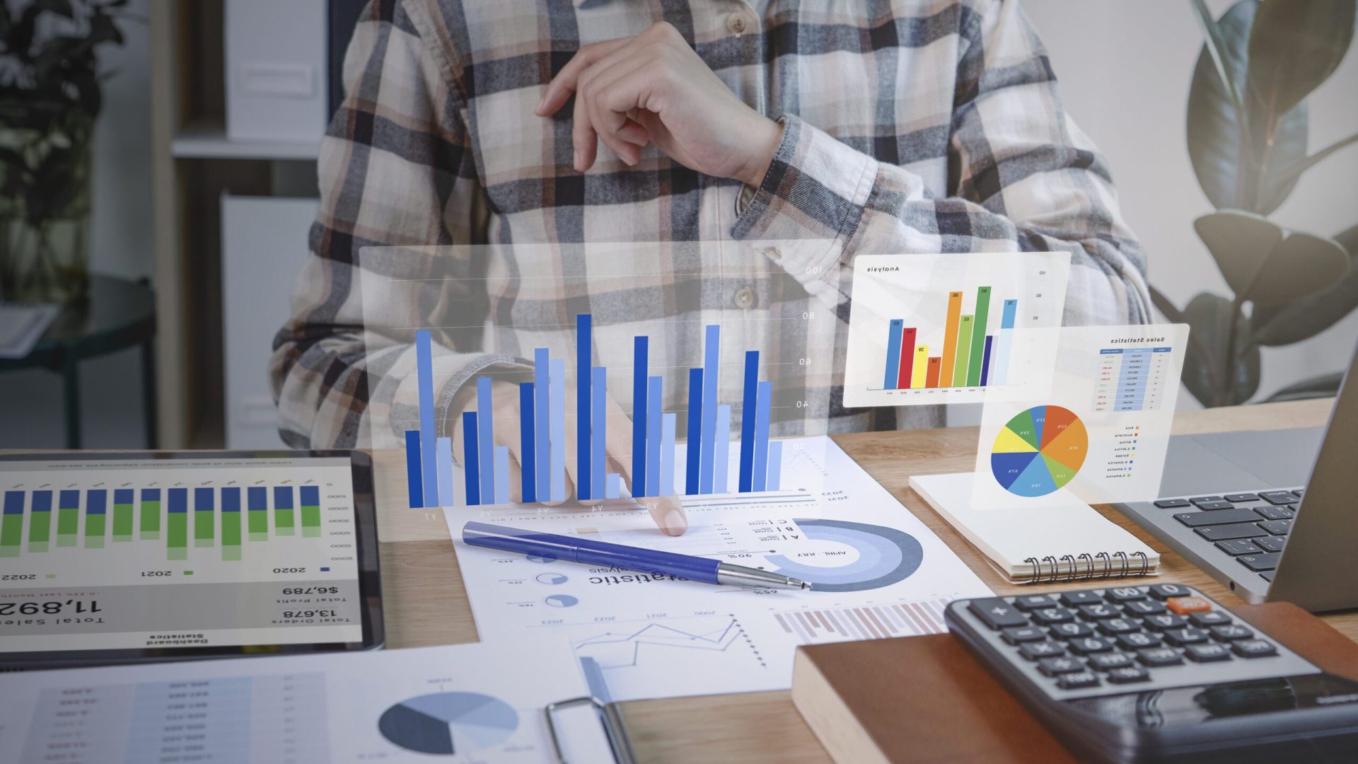 Businesspeople working in finance and accounting Analyze financi Businesspeople working in finance and accounting Analyze financial graph budget and planning for future in office room.